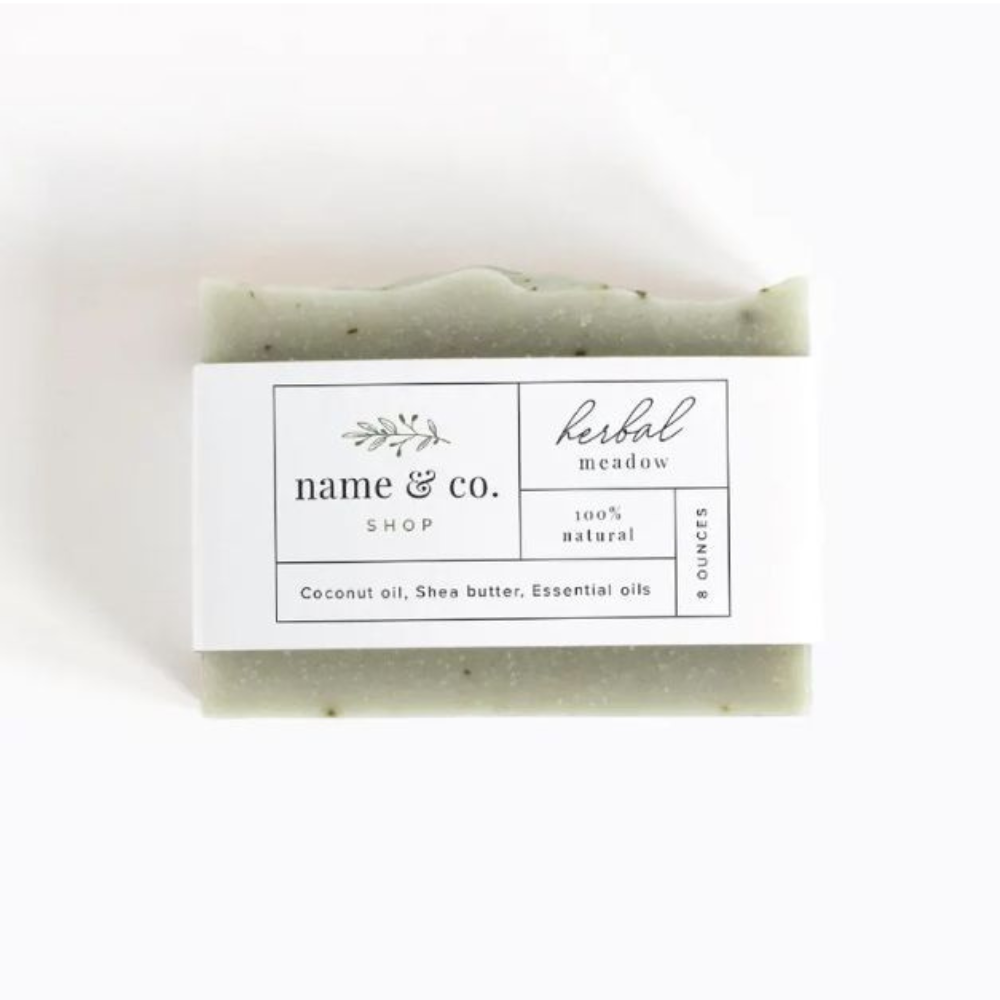Soap bars wrapped in custom-printed sleeves.