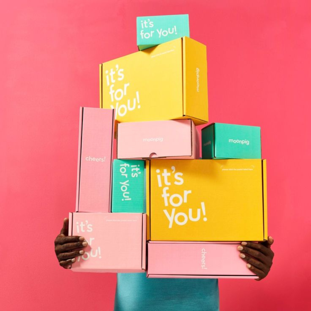 Custom mailer boxes with personalized branding and vibrant designs.