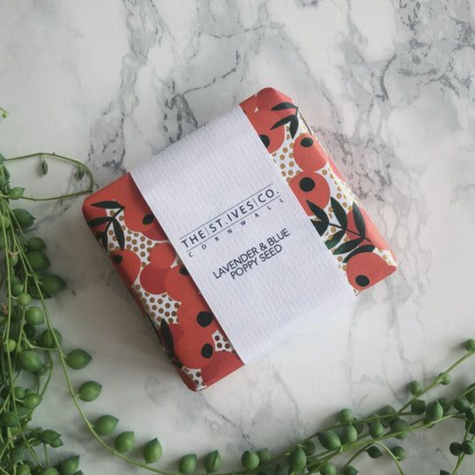 Printed soap wrapping paper with custom branding for handmade soaps.